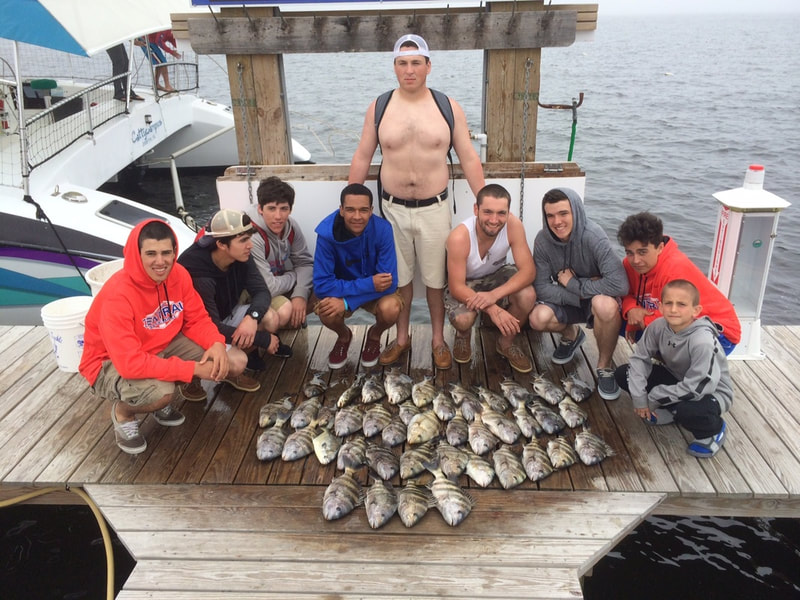 Slammer fishing trip - 2 boats with 5 passengers and a catch of the day Destin, FL