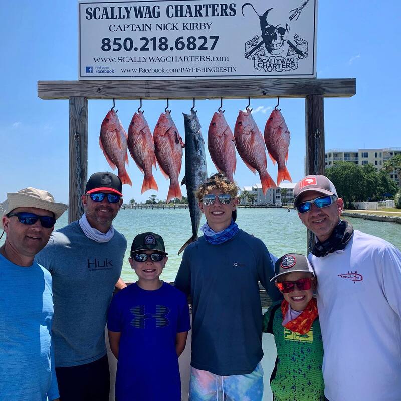 Father son team killed it! Red snappers and king mackerel catch of the day.