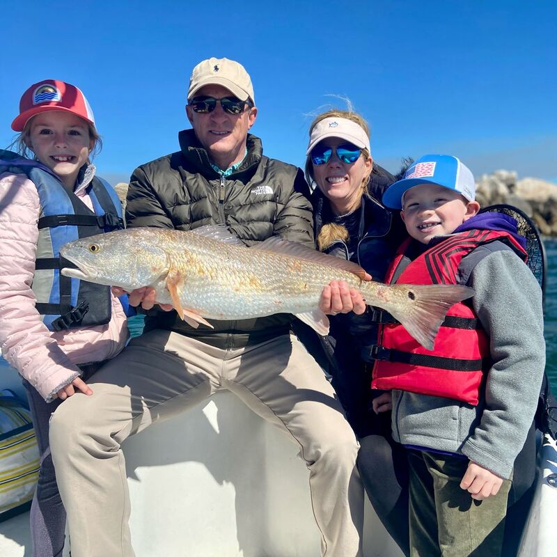 Mom Dad and kids enjoying their Spring Break fishing in Destin Florida
